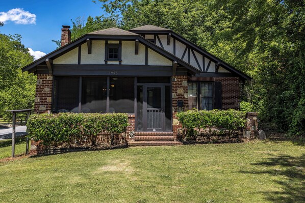 Create lasting memories in this Midtown Tudor home with park views