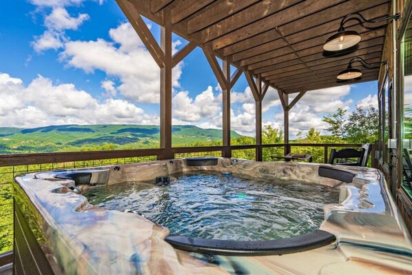 Stunning views from the outdoor jacuzzi at Serenity Lodge!