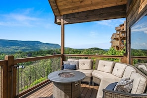 Lounge on the balcony at Serenity Lodge overlooking the Smoky Mountains