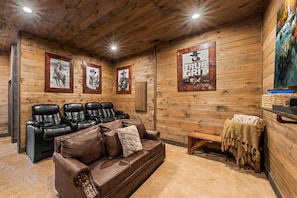 Cinema-style seating in Serenity Lodge is perfect for movie night