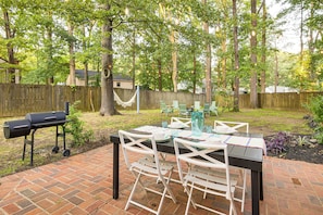 Fenced-In Yard | Outdoor Dining Space | Charcoal Grill | Cornhole