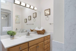 Bathroom with wide vanity mirror