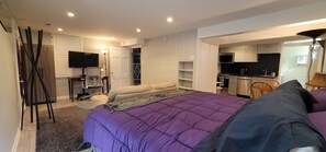This studio is one large room with kitchen and dining area nearby