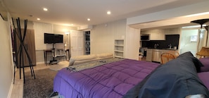 This studio is one large room with kitchen and dining area nearby