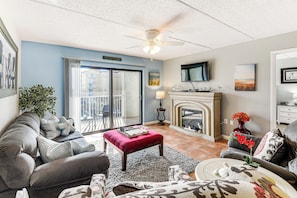 Living Room | Single-Story Condo on 5th Floor | Full Sleeper Sofa