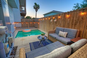 Private pool and outdoor lounging area. (Shore Thang)