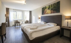 Unit with 2 single beds. Exact unit will be assigned upon arrival. Views, colors, and decor may vary.