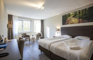 Unit with 2 single beds. Exact unit will be assigned upon arrival. Views, colors, and decor may vary.