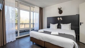 Unit with double bed. Exact unit will be assigned upon arrival. Views, colors, and decor may vary.