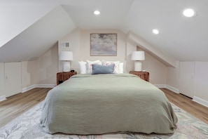 Third floor bedroom with queen size bed