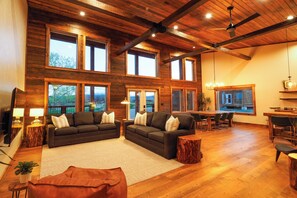 Built for Togetherness, Across Generations
From first steps to family toasts, this sunlit great room welcomes everyone. With room to sprawl, chat, and reconnect—from grandparents to grandkids—it’s the heart of the East Cabin, designed to bring your whole crew together in comfort and style.