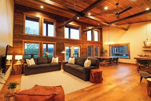 Built for Togetherness, Across Generations
From first steps to family toasts, this sunlit great room welcomes everyone. With room to sprawl, chat, and reconnect—from grandparents to grandkids—it’s the heart of the East Cabin, designed to bring your whole crew together in comfort and style.