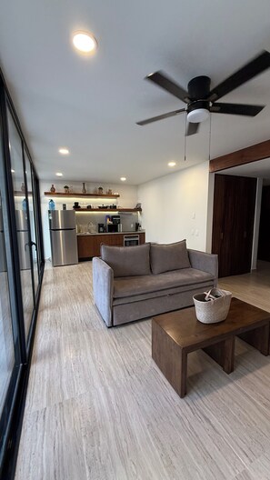 Indoor-outdoor living with island for cooking or relaxing with friends and family.
