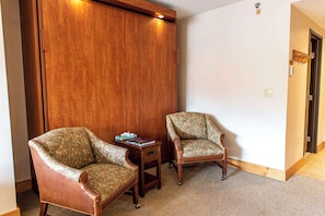 Sitting Area and King Murphy Bed | Listed with @BookTraverse
