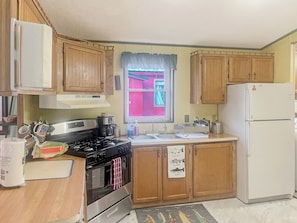Whip up your favorite meals in this beautifully designed kitchen