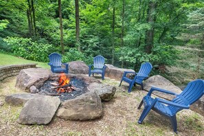 Timber Tails' firepit and grill area