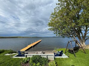 Shared fire pit/beach area and dock available for guest use!