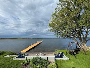 Shared fire pit/beach area and dock available for guest use!