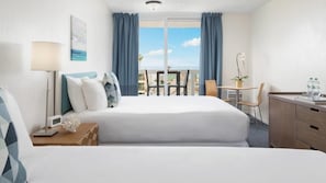 Unit with 2 Double beds. Exact unit will be assigned upon arrival. Views, colors, and decor may vary.