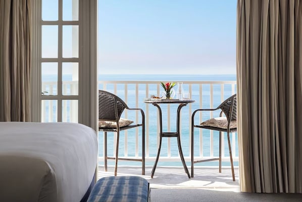 Unit with 1 King bed and 1 Queen bed. Exact unit will be assigned upon arrival. Views, colors, and decor may vary.