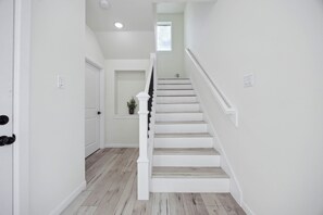 Welcome in! 

Entryway with one bedroom on the first floor.