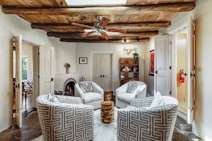 Natural skylight by day the cozy scent of burning piñon by night.