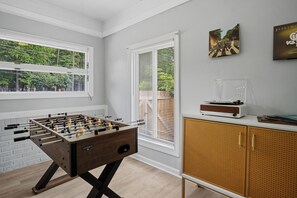Game room with foosball and vinyl player