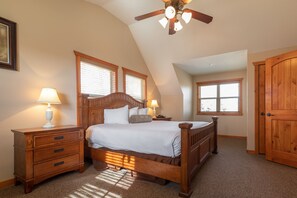 Unwind in another inviting king bedroom that offers the same warm, rustic charm and natural light, ensuring restful nights for every guest.