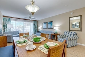 Gather for memorable meals in the inviting full kitchen and dining area, perfect for family gatherings after a day at the beach.