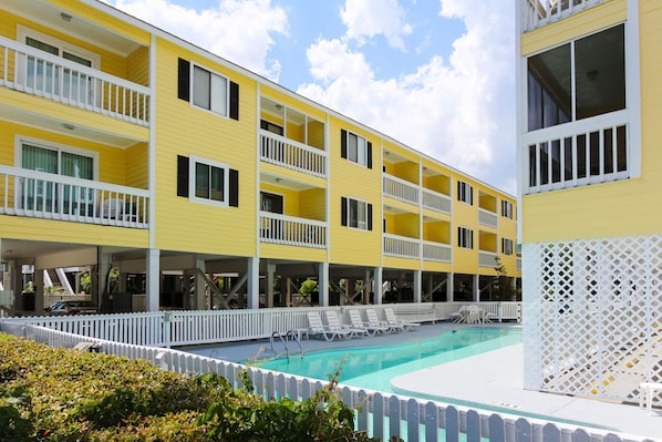 Enjoy the spacious design of this family-friendly condo featuring two balconies, a full kitchen, and a cozy dining area perfect for memorable meals.