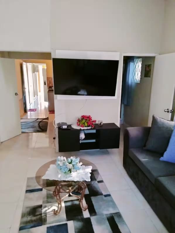 60'' FLAT SCREEN wall unit bathroom, side table, passage way