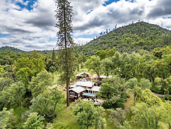 Exterior of our home. Enjoy this peaceful ranch retreat near Yosemite—relax with mountain views, fresh air and hang out with our sweet horses and chickens. Enjoy fresh eggs for breakfast from our chicken house!