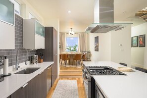 Beautifully updated, fully stocked open concept kitchen