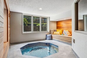 Ultimate luxury awaits in your own private spa room with custom hot tub and full sized sauna!