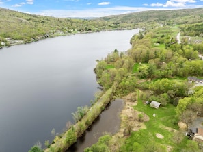 Our home abuts the Northern Rail Trail (literally steps from the front door), which follows the lake for quite some time.