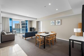 Spacious living area with modern furnishings and natural light.