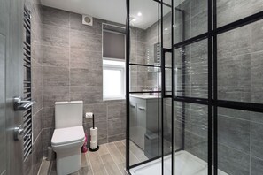 Full Bathroom:
- Sink
- Toilet
- Electric Shower