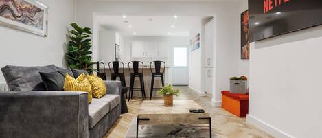 Comfortable Living Space featuring:
-1 large open-plan lounge/kitchen/dining area
-Lounge area near the front window, perfect for natural light and relaxing
-Smart TV with Netflix
-1 x small sofa bed