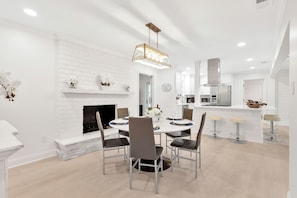 Dining table for 6 and kitchen island seating for 4—perfect for meals and gatherings.