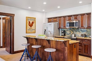 Fully Equipped Kitchen with Bar Stool Seating