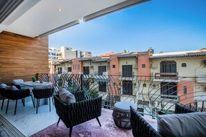 Private Balcony — Enjoy the fresh air on your private balcony, complete with quality outdoor furniture