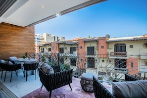 Private Balcony — Enjoy the fresh air on your private balcony, complete with quality outdoor furniture