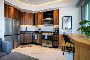 Kitchen — Sleek and well-equipped kitchen