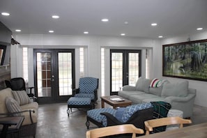 Downstairs living area, large sofa for sleeping, + Queen inflatable mattress
