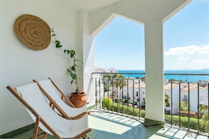 Outdoor lounge area with seaview.
