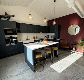 Kitchen opening onto dining room