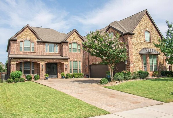 Great curb appeal and the only house with stamped concrete driveway in the neighborhood