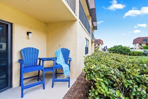 Ground floor private outdoor patio- steps from the beach