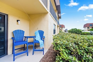 Ground floor private outdoor patio- steps from the beach