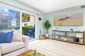Sliding glass door that leads to outdoor patio